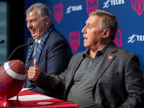 Canadian Football League commissioner Randy Ambrosie, left, laughs while listening to Gary Stern, new owner, with parner Sid Siegel, of the Montreal Alouettes answer questions at press conference in Montreal Monday January 6, 2020.
