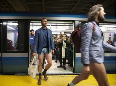 Participants of the annual No Pants Day disembark the métro in Montreal on Sunday, Jan. 12, 2020.