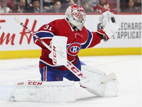 Montreal Canadiens Carey Price makes a glove save during second period of National Hockey League game against the Calgary Flames in Montreal Monday January 13, 2020.