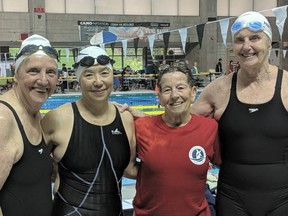 Left to right, Mae Waldie, Helena Lui, Judie Oliver and Gail Whittaker pose after breaking a world record and winning gold in the 4 x 100m medley relay in their category at the 2019 Canadian Masters Swimming Championship.