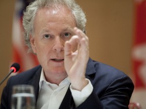 Jean Charest, seen in a file photo, cited a UPAC investigation dubbed "Mâchurer," launched to investigate allegations of illegal financing of the Quebec Liberal Party, as the reason for the lawsuit.