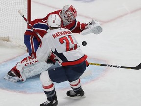 Montreal Canadiens goaltender Carey Price stops shot by Washington Capitals' Garnet Hathaway (21) during the second period in Montreal on Monday January 27, 2020.