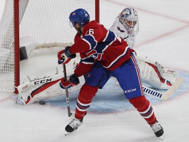 Montreal Canadiens' Jeff Petry (26) slides puck past Washington Capitals goaltender Braden Holtby for the first goal of the night on Monday January 27, 2020.