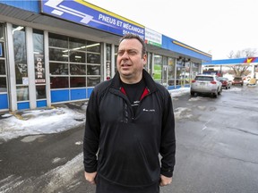 Lorenzo Arena, see here at his tire shop in Dorval, is hoping to relocate by summer as Parkland Fuel Corporation is seeking to rezone the Ultramar property on Sources Blvd. to allow for a café outlet.
