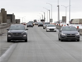 Cars travel westbound on Highway 20 near the exit for Ville St-Pierre: Some motorists are complaining about the lack of painted line markers.