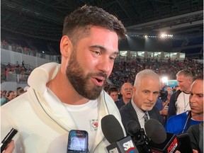 Kansas City Chiefs guard Laurent Duvernay-Tardif answers questions at the Super Bowl LIV Opening Night festivities in Miami on Jan. 27, 2020.