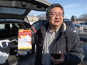 "I'm sending these (surgical masks) to my former colleagues who work on the front lines in hospitals in China," says Haiying Mao, seen in Brossard on Thursday, Jan. 30, 2020.