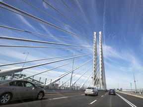 Cars cross over the Samuel-De Champlain Bridge.