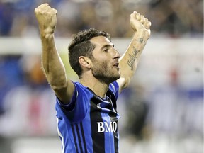 Montreal Impact's Ignacio Piatti celebrates his second goal of the game during first half against the Chicago Fire in Montreal on Aug. 16, 2017.