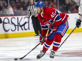 Canadiens right-winger Joel Armia gets set to shoot puck during NHL game against the San Jose Sharks at the Bell Centre in Montreal on Oct. 24, 2019.