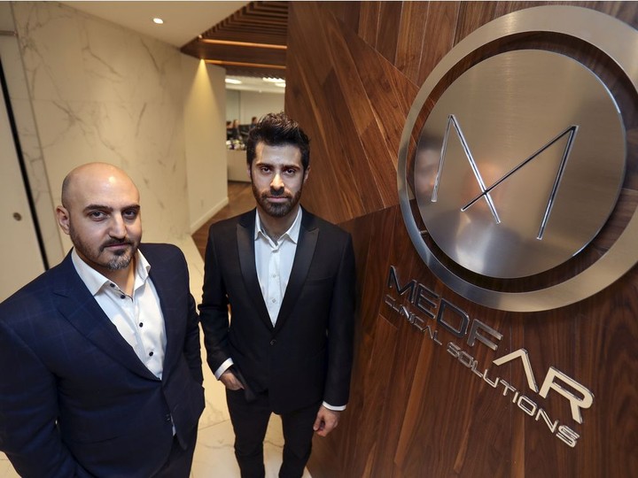  Elias Farah, left, CEO, and Patrick Issid, chief product officer, co-founders of Medfar, in the software company’s Montreal office. JOHN MAHONEY / MONTREAL GAZETTE