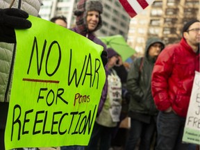 Anti-war demonstrators rally on January 4, 2020 in Seattle, Washington. Demonstrators rallied across the U.S. Saturday in response to increased tensions in the Middle East as a result of a U.S. airstrike that killed an Iranian general last week.