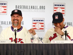 Larry Walker and Derek Jeter speak to the media in New York on Wednesday after being elected into the National Baseball Hall of Fame Class of 2020.