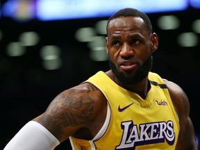 NEW YORK, NEW YORK - JANUARY 23: LeBron James #23 of the Los Angeles Lakers looks on against the Brooklyn Nets at Barclays Center on January 23, 2020 in New York City. NOTE TO USER: User expressly acknowledges and agrees that, by downloading and or using this photograph, User is consenting to the terms and conditions of the Getty Images License Agreement. Mandatory Copyright Notice: Copyright 2020 NBAE.