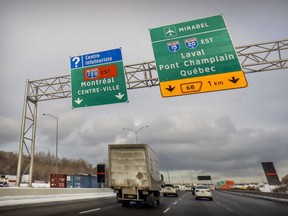 Traffic heads east through the Turcot Interchange on Highway 20 in Montreal on Dec. 6, 2019.