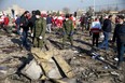 Security officers and Red Crescent workers are seen at the site where the Ukraine International Airlines plane crashed after take-off from Iran's Imam Khomeini airport, on the outskirts of Tehran, Iran January 8, 2020. Nazanin Tabatabaee/WANA (West Asia News Agency) via REUTERS