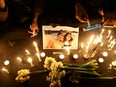 Sympathizers and families of the victims of the crash of the Boeing 737-800 plane, flight PS 752, light candles as they gather to show their sympathy in Tehran, Iran January 11, 2020.