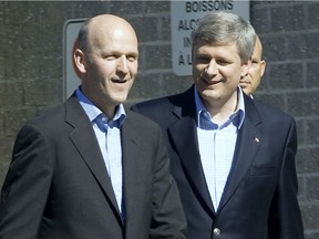 Former prime minister Stephen Harper named Michael Fortier (left) to the Senate and then a minister so Montreal could have a voice in the cabinet.