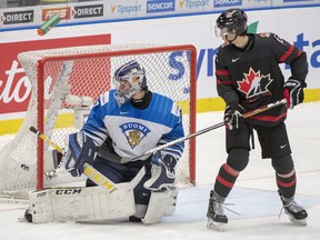 Finland goalie Justus Annunen lets in the fifth goal as Canada's Dylan Cozens looks on during second period semifinal action at the World Junior Hockey Championships on Saturday, Jan. 4, 2020 in Ostrava, Czech Republic. (THE CANADIAN PRESS/Ryan Remiorz)