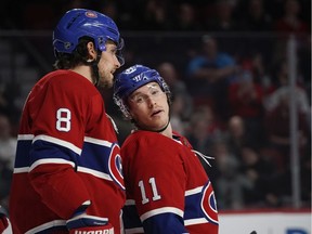 Montreal Canadiens defenseman Ben Chiarot, left, speaks with right winger Brendan Gallagher before a puck drop during NHL action in Montreal, on Wednesday, December 11, 2019.