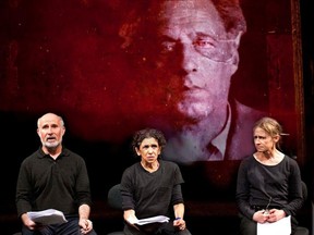 Left to right: Marcello Magni, Kathryn Hunter and Hayley Carmichael perform before an image of director and Stalinist victim Vsevolod Meyerhold in Why?, a new piece from Peter Brook and Marie-Hélène Estienne.