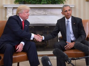 Two very different styles: Nov. 10, 2016, U.S. President Barack Obama and President-elect Donald Trump shake hands during a transition planning meeting in the Oval Office at the White House in Washington, DC.