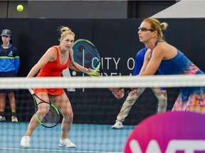 Ottawa's Gabriela Dabrowski, left, and Croatia's Darija Jurak in action during the Adelaide International women's doubles final against Yifan Xu of China and Nicole Melichar of the U.S. on Friday, Jan. 17, 2020.