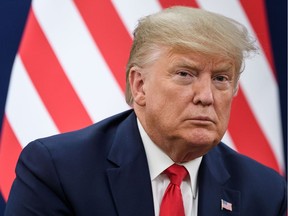 US president Donald Trump attend a bilateral meeting during the World Economic Forum (WEF) annual meeting in Davos, on January 21, 2020. (Photo by Fabrice COFFRINI / AFP)