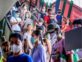 Bangkok commuters Jan. 27, 2020, during a coronavirus outbreak.
