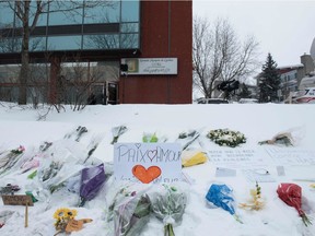 Messages are placed near a mosque that was the location of a shooting spree in Quebec City, Quebec on February 1, 2017.