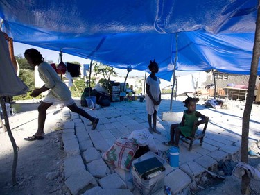 Children play in a communal tent that has become a makeshift post-quake home for several families in Port-au-Prince, Haiti, on January 29, 2010.