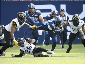 Toronto Argonauts' James Wilder Jr. goes over the top for short yardage during the first quarter in Toronto on June 22, 2019.