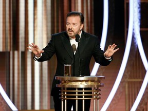 Ricky Gervais, with his pint of beer, hosting the 77th Golden Globe Awards - Show - Beverly Hills, California, U.S., January 5, 2020.