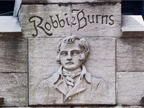 Closeup of Robbie Burns atop the Seagram's Building (1928), now McGill University's Martlet House, at 1430 Peel St in Montreal, on Tuesday, July 17, 2012: The Scottish poet, born in 1759, celebrated around the world.