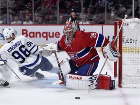 Canadiens goalie Charlie Lindgren thwarts Maple Leafs forward Egor Korshkov during game at the Bell Centre during the pre-season.