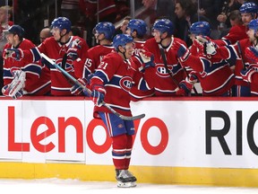 Canadiens' Nick Cousins celebrates his goal against the Vegas Golden Knights with teammates during the first period at the Bell Centre on on Jan. 18, 2020.