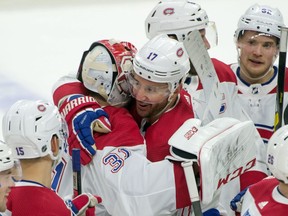 Montreal Canadiens' Ilya Kovalchuk (17) celebrates with goalie Carey Price (31) after his goal in overtime against the Senators at the Canadian Tire Centre in Ottawa on Jan. 11, 2020.