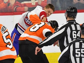 Canadiens' Jesperi Kotkaniemi lands a punch during his fight with Flyers defenceman Robert Hagg Thursday night in Philadelphia.
