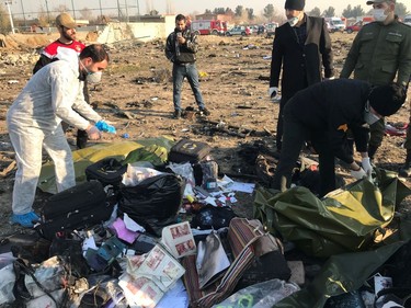 Passengers' belongings are seen after the Ukraine International Airlines plane crashed after take-off from Iran's Imam Khomeini airport, on the outskirts of Tehran, Iran January 8, 2020.