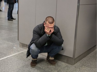 A relative of a victim of the Ukraine International Airlines PS 752 plane that crashed after taking off from Tehran's Imam Khomeini airport reacts at Boryspil International Airport, outside Kiev, Ukraine January 8, 2020.