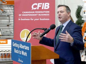 Alberta Premier Jason Kenney gestures as he speaks at Arn's Equipment in Calgary on Jan. 21, 2020.