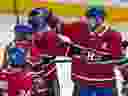 Canadiens defenceman Jeff Petry (right) celebrates with teammates after Brendan Gallagher scored during third period of NHL game against the Florida Panthers at the Bell Centre in Montreal on Feb. 1, 2020.