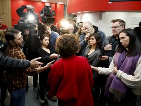 Sue Montgomery speaks to the media as she arrives for the C.D.N.-N.D.G. borough council meeting on Monday.