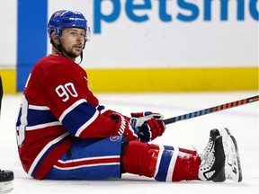 Canadiens forward Tomas Tatar sits on the ice after being knocked down during NHL game against the Anaheim Ducks at the Bell Centre in Montreal on Feb. 6, 2020.