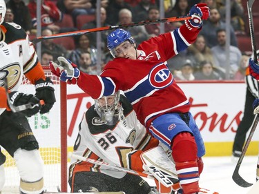 Montreal Canadiens Brendan Gallagher falls into Anaheim Ducks John Gibson during first period of National Hockey League game in Montreal Thursday February 6, 2020.