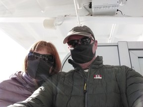 Bryan Doyle and his wife, Lucie Mauro, took a selfie on the balcony of their cabin aboard a Princess Diamond cruise that has been  quarantined for fear of coronavirus since Feb. 4.
