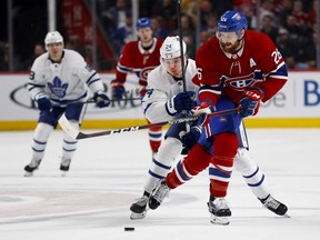 Toronto Maple Leafs right-winger Kasperi Kapanen chases Montreal Canadiens defenceman Jeff Petry in Montreal on April 6, 2019.