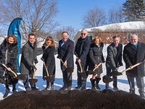Ground-breaking ceremony in l'Assomption on Sunday kicked off of construction on what will become the Maison Jacques-Parizeau. Among those who hoisted shovels were Parizeau's widow, Lisette Lapointe, third from the right, Premier François Legault, fourth from the left, Nathalie Roy, third from left, Minister of Culture and Communications.