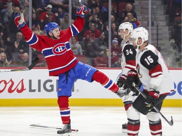 Montreal Canadiens Jake Evans celebrates the first goal of his NHL career in front of Arizona Coyotes Brad Richardson, right, and Carl Soderberg during first period of National Hockey League game in Montreal Monday February 10, 2020.