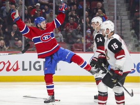 Canadiens rookie Jake Evans celebrates the first goal of his NHL career in front of Coyotes' Carl Soderberg, 34, and Brad Richardson at the Bell Centre on Monday.
